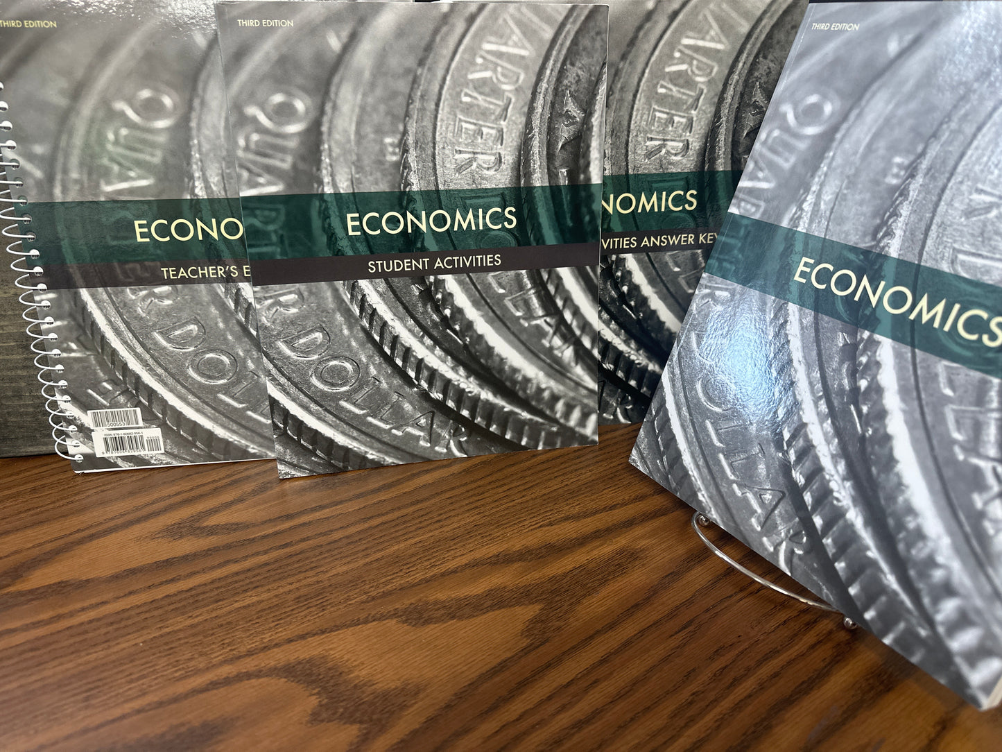 Economics set, text, teacher, student activities with key