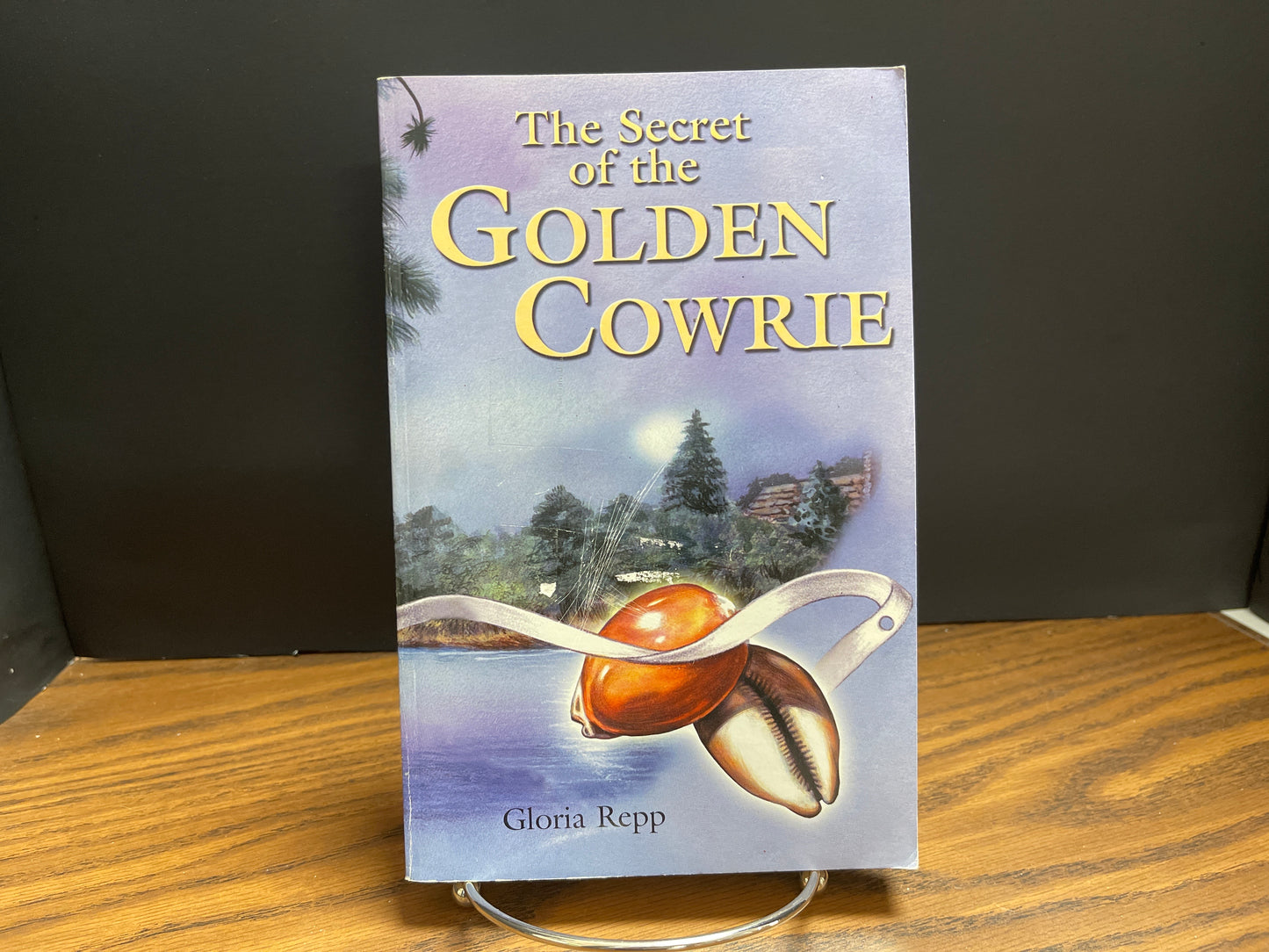 Secrets of the Golden Cowrie - Repp